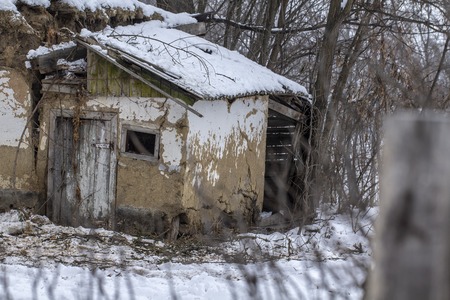 Old abandoned rural house, with signs of destruction from lack of care. Backgroundの写真素材
