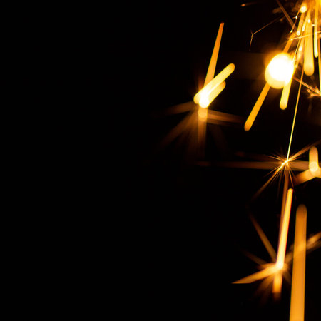 Christmas sparkler isolated on black background. Bengal fire close up