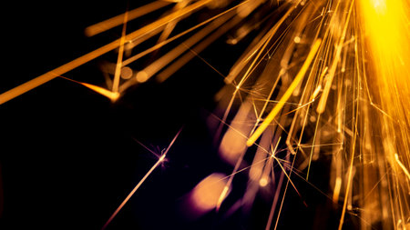 Christmas sparkler isolated on black background. Bengal fire close up