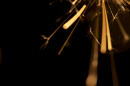 Christmas sparkler isolated on black background. Bengal fire close upの写真素材