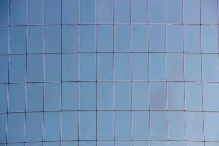 Glass windows of skyscrapers, texture. Matte surface not reflecting the sky. Texture