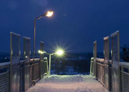 empty pathway on the overpass bridge under the sky train railway track at morningの写真素材