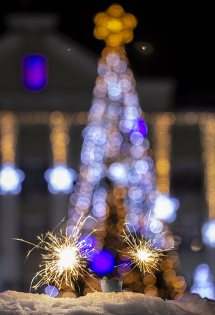 Christmas tree light night blur bokeh holiday abstract backgroundの写真素材