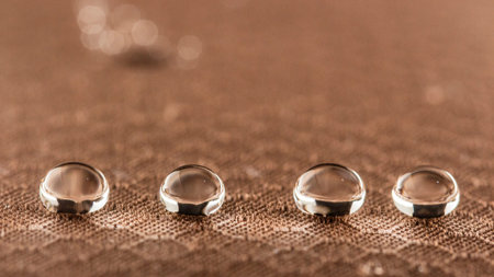 Water droplets on moisture resistant fabric Close up macro