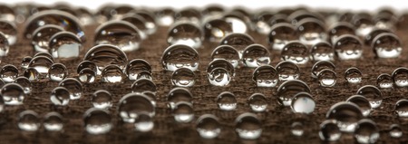 Water droplets on moisture resistant fabric Close up macroの写真素材