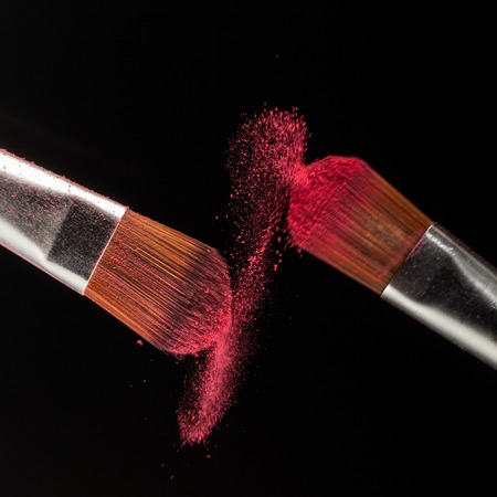 powder splash and brush for makeup artist or beauty blogger in black backgroundの写真素材