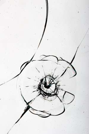 Cracked glass on a white background textureの写真素材
