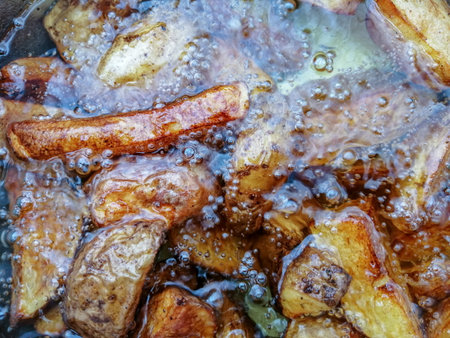 French Fries Boiling In Hot Oil close up texture