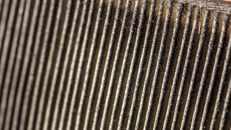 dirty car air filter, on a white background close up, expendableの写真素材