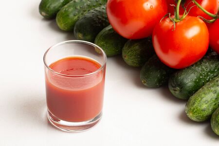 Fresh tomato juice isolated on white backgroundの写真素材