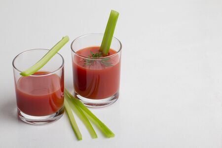 Fresh tomato juice isolated on white backgroundの写真素材