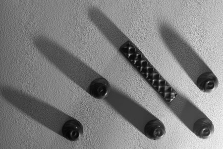 Chocolate homemade chocolates on a white paper background