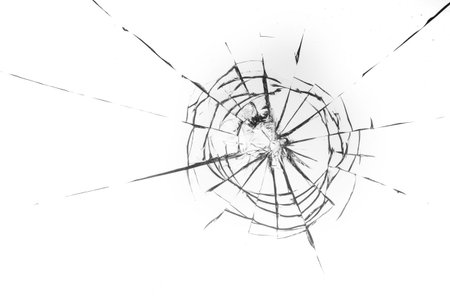 Cracked glass on a white background close up