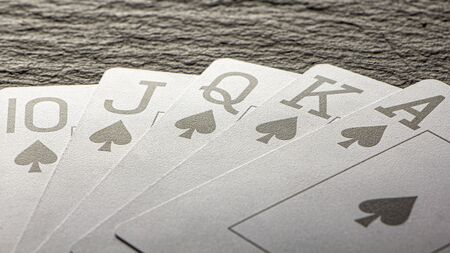 Royal Flush on a black background, a very rare poker hand close upの写真素材