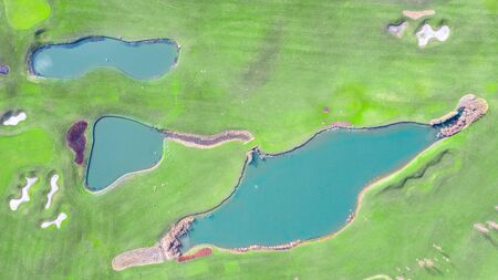 High quality golf courses with lakes in Mezhigorye National Park. Green grass, small blue lakes.の写真素材