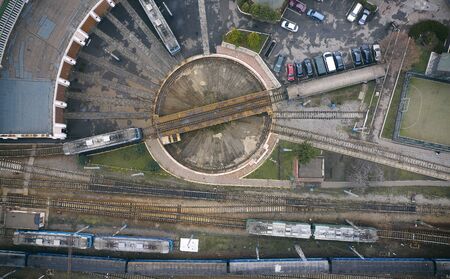Wagon depot and repair shops, top view. Assembly workshops for the construction of new trains for freight and passenger cars for rail transport and heavy industry.の写真素材