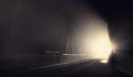 Mystical atmosphere on the night railway bridge.の写真素材