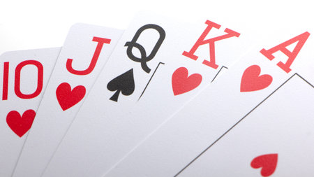 Poker hand. Incomplete Royal Flash on a black background.