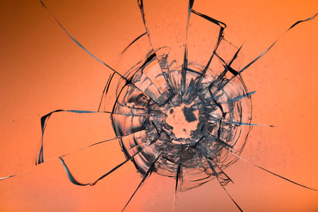 Cracks on the glass on a white background. Broken window.