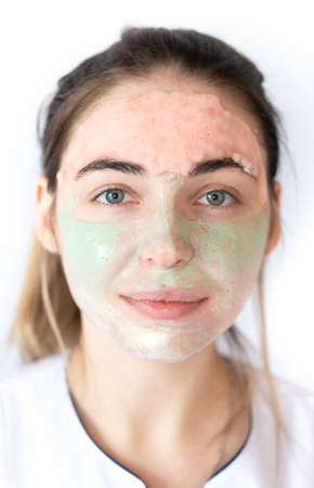 Pore cleansing mask on the face of a young attractive woman.の写真素材