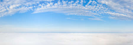 Wonderful dawn over the clouds. white clouds and blue sky.の写真素材