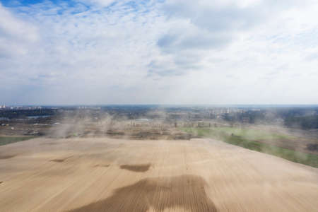 Dust storm on an agricultural field. Drone viewの写真素材