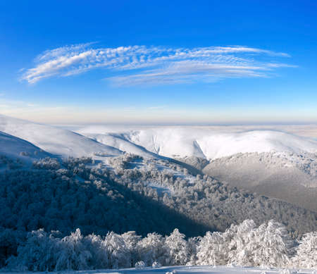 Dawn on snowy peaks after a blizzardの写真素材