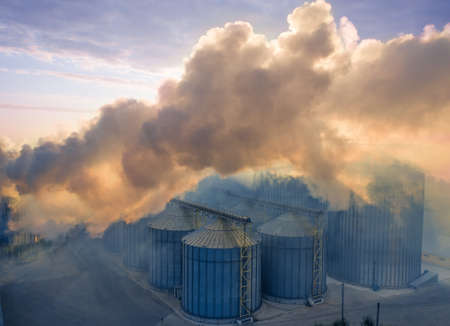 Harmful emissions from heavy industry are causing global warming and climate change.の写真素材