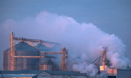 Harmful emissions from heavy industry are causing global warming and climate change.の写真素材