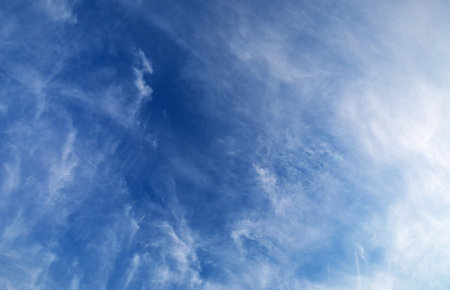 white fluffy clouds natural abstract background. Blue sky.