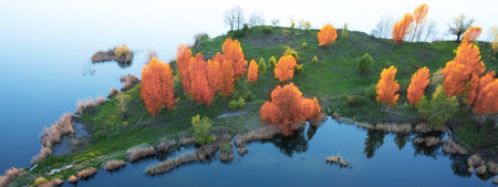 Quarry for mining and enrichment of titanium and other rare ores. Blue water in the enrichment tank.の写真素材