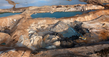 The reservoir is contaminated with chemicals and heavy metals. Drone view. Multicolored water.