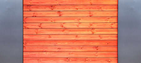 The yellow plank wall is aged naturally.の写真素材