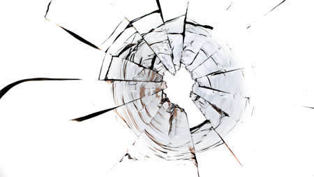 Bullet hole in the glass on a white background. macro.の写真素材