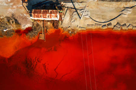 Toxic emissions into the water, bad environment. The impact of metallurgical plants on the environment.の写真素材
