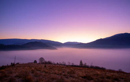 Wonderful autumn mountain landscape. Before dawn or after sunset.の写真素材
