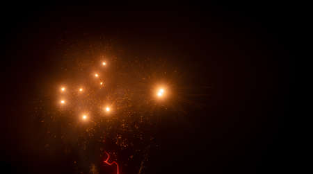 Multicolored fireworks on a background of night sky. holiday background.の写真素材