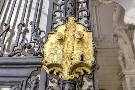 VIENNA, AUSTRIA - JUNE 25, 2016: Metal gate with lock, Detail of Winter Palace (Stadtpalais) of Prince Eugene Savoy is an important high baroque palace in Vienna. It was constructed 1695 - 1724.のeditorial素材