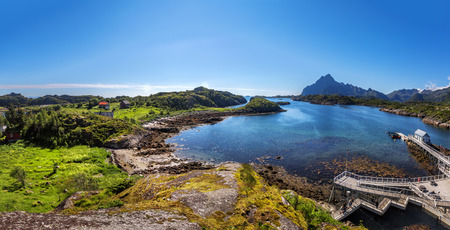 Scenic view of the waterfront harbor in Svolvaer in summer. Svolvaer is a fishing village and tourist town located on Austvagoya in the Lofoten Islands. Norway.の写真素材