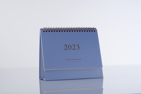 2023 desk calendar against white backgroundの写真素材
