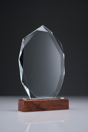 crystal trophy against gray backgroundの写真素材