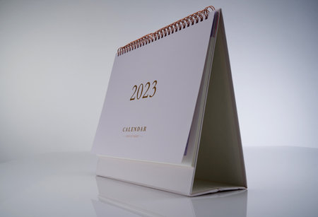2023 desk calendar against white backgroundの写真素材