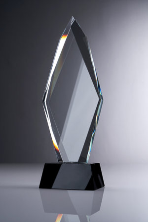 crystal trophy against gray backgroundの写真素材