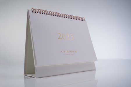2023 desk calendar against white backgroundの写真素材