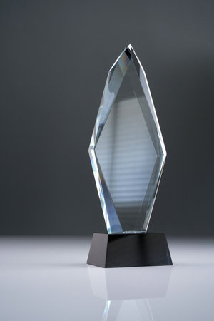 crystal trophy against gray backgroundの写真素材