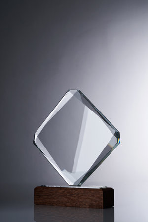 crystal trophy against gray backgroundの写真素材