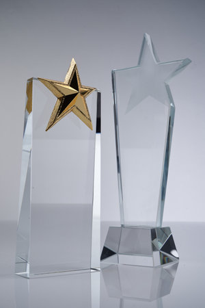 star shape crystal trophy against white backgroundの写真素材