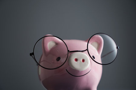 cute piggy bank with round eyeglassesの写真素材