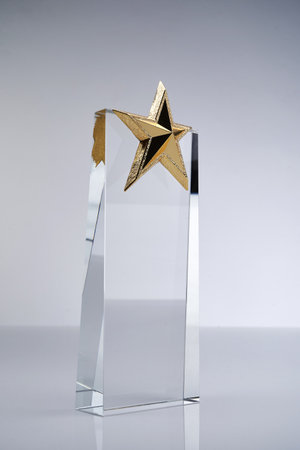 star shape crystal trophy against white backgroundの写真素材