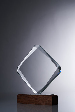 crystal trophy against gray backgroundの写真素材